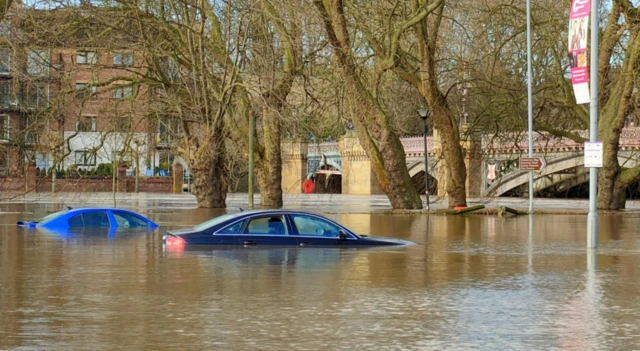 Cars in flooded St George's Field, York