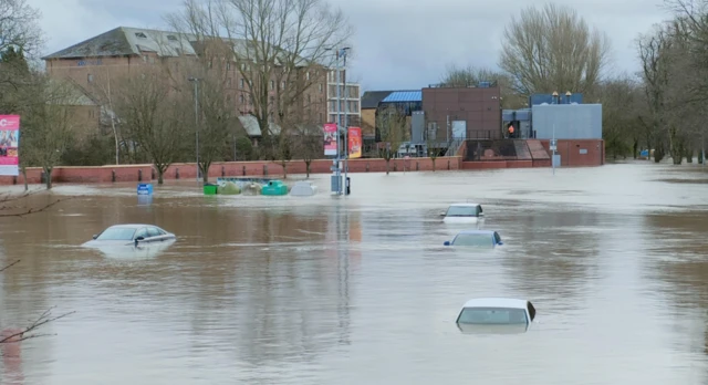 Cars in flooded St George's Field, York