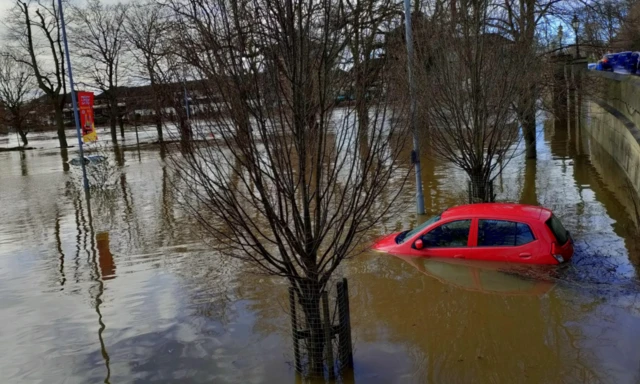 Cars in flooded St George's Field, York