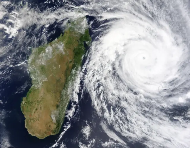 A handout satellite image shows tropical cyclone Emnati en route towards the eastern coast of Madagascar