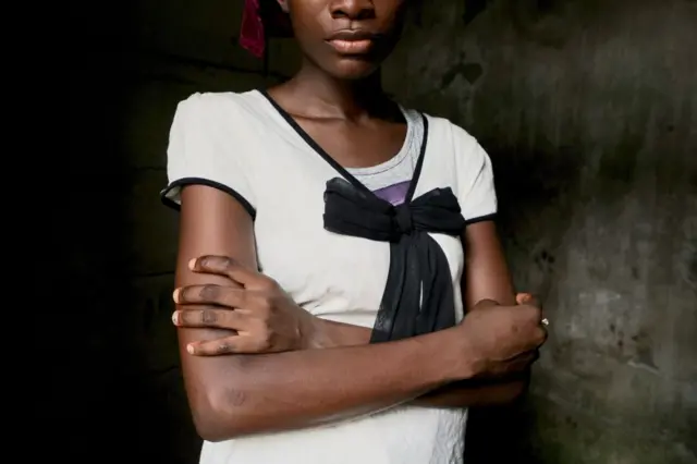 Cameroonian woman posing for photo