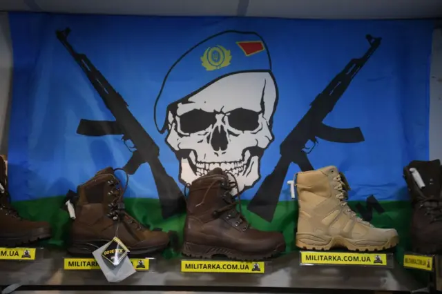 Combat-style boots being sold by a Kyiv shop on Wednesday