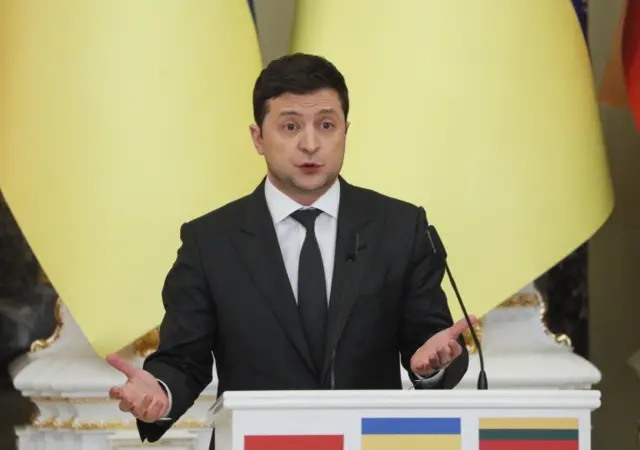 Ukrainian President Volodymyr Zelensky speaks during a press conference