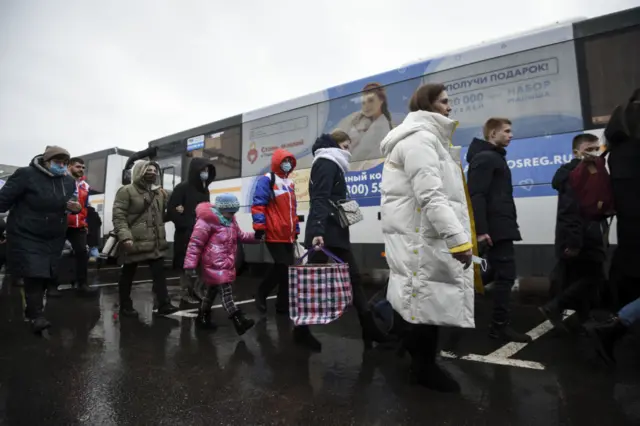 Civilians arrive in Moscow after being evacuated from the Donbas region