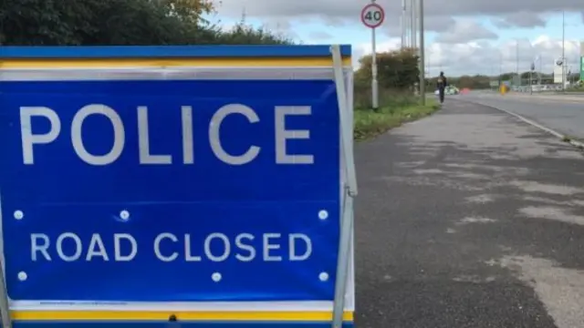 Road closed sign