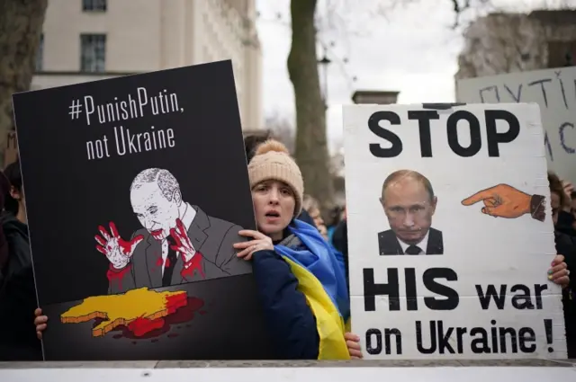 Ukrainians hold a protest against the Russian invasion of Ukraine outside Downing Street