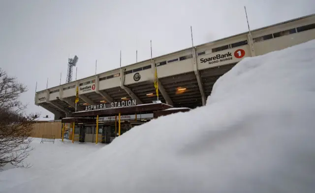 Snow piled up outside the stadium