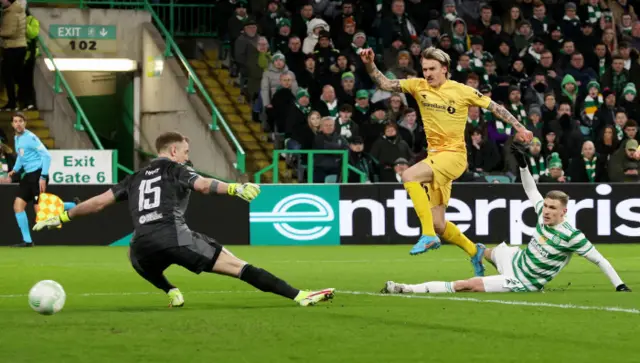 Runar Espejord, who scored the first goal at Celtic Park and laid on the second, stands at 6ft 2in