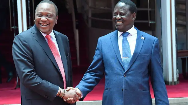 President Uhuru Kenyatta (left) greeting Raila Odinga