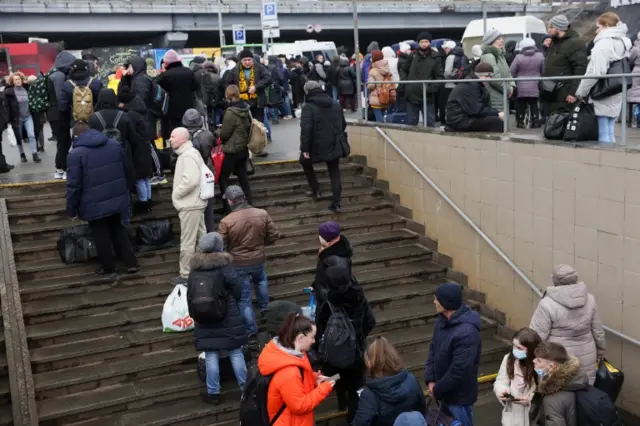 People wait at a bus station in Kyiv, Ukraine. Photo: 24 February 2022