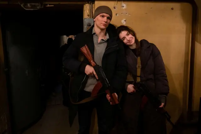 A Ukrainian volunteer holding a rifle