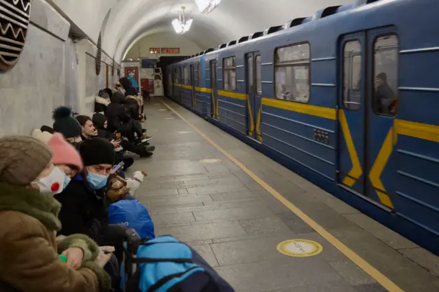 People take shelter from bombings in Kyiv