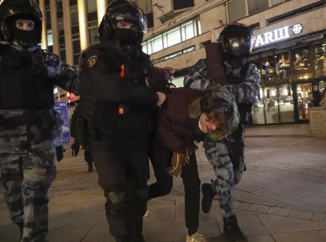 Russian policemen detain a protestor during a rally against the entry of Russian troops into Ukraine in Moscow, Russia, 25 February 2022