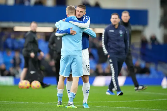 Oleksandr Zinchenko embraces Vitaliy Mykolenko