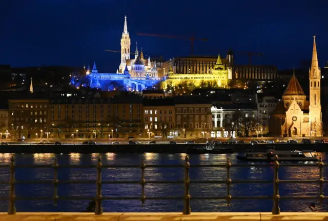 The Fisherman's Bastion, one of the main attractions of the Hungarian capital Budapest, is illuminated in the Ukrainian national colors in the Buda Castle on February 25, 2022 on the request of Budapest's Mayor Gergely Karacsony