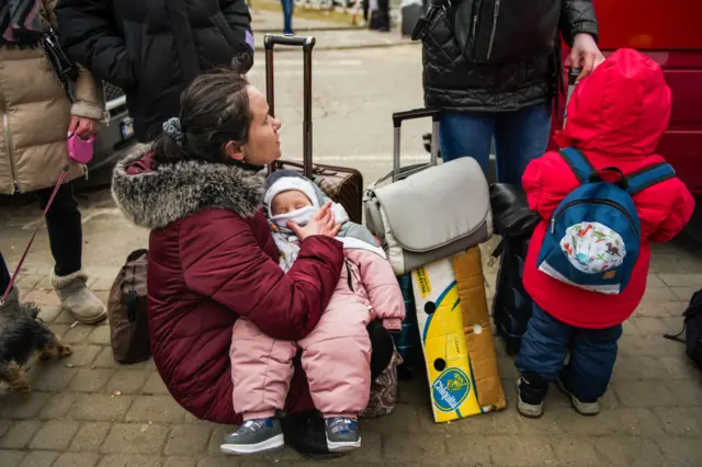 Ukrainian refugees at the Medyka border crossing to Poland.