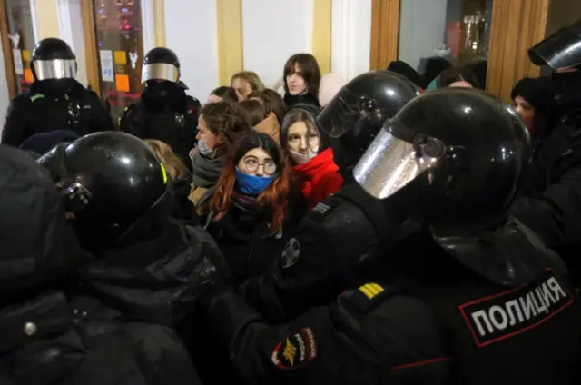 Protesters being encircled by Russian police in St Petersburg