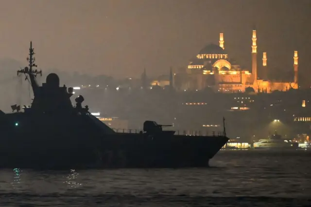 Russian Navy's Project 22160 Patrol Vessel Dmitriy Rogachev 375 sails through the Bosphorus Strait on the way to the Black Sea past the city Istanbul as Suleymaniye mosque is seen in the backround on February 16, 2022