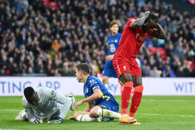 Chelsea goalkeeper Edouard Mendy saves from Liverpool's Sadio Mane