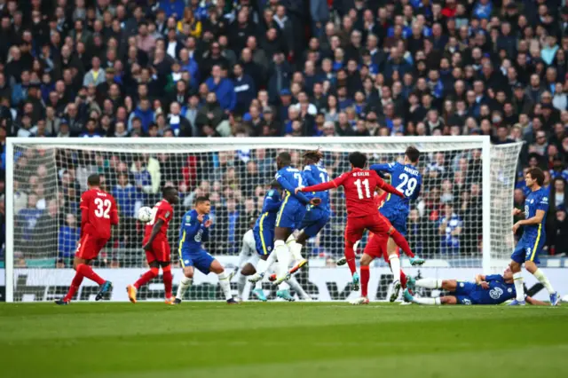 Liverpool's Mohamed Salah takes a free kick