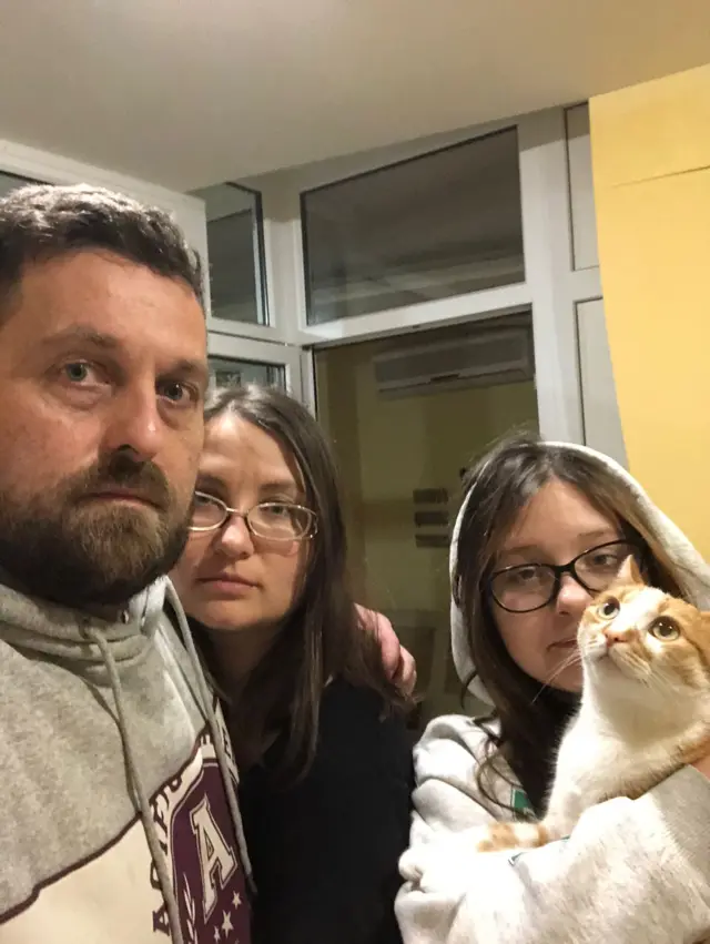 Dan Baker with family in shelter