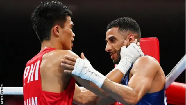 Briton Galal Yafai (right) beat Filipino flyweight Carlo Paalam to win gold at the Tokyo Olympics