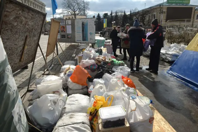 Ukrainian volunteers collect foods for people in Kharkiv