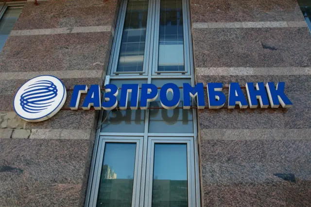 The logo of Gazprombank seen on a residential building during the sanctions against Russian banks