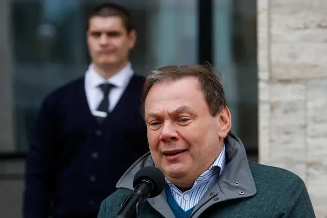 Mikhail Fridman speaks to reporters