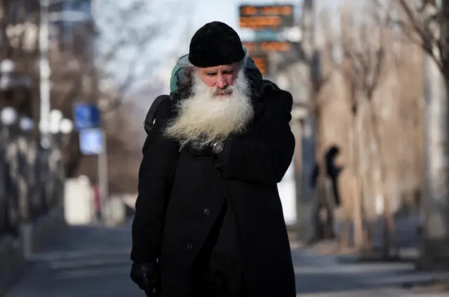 Residents walking around Kyiv