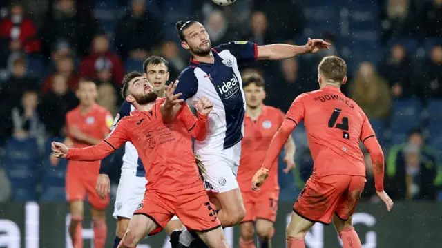 Andy Carroll rises for a header