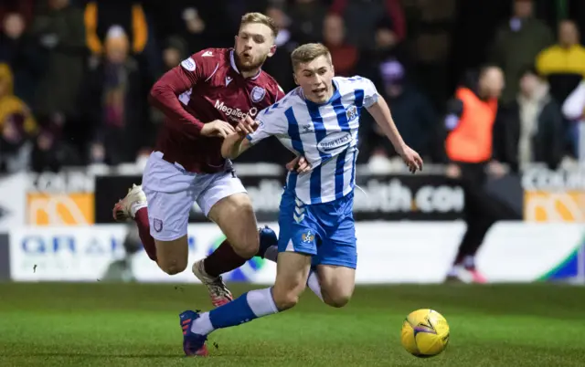 Arbroath's Scott Stewart tackles Kilmarnock's Dean Campbell