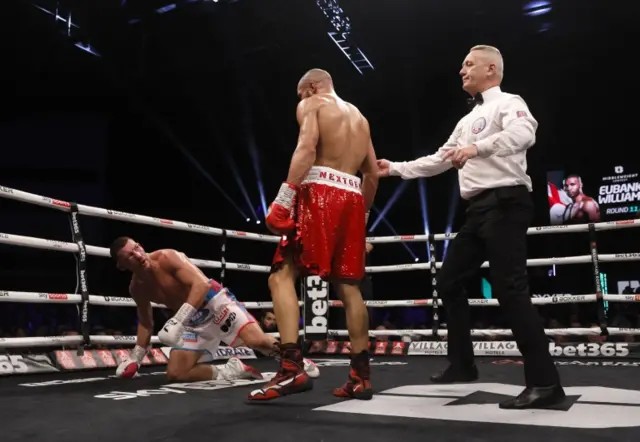 Liam Williams is knocked down for a fourth time by Chris Eubank Jr