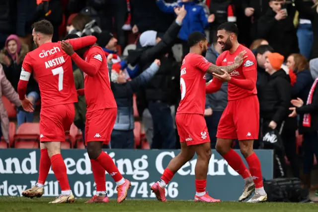 Alex Penny celebrates