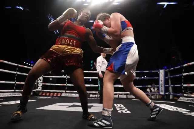 Claressa Shields connects with a punch to the body of Ema Kozin