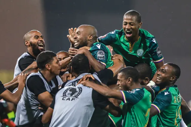 Comoros celebrate their third goal against Ghana