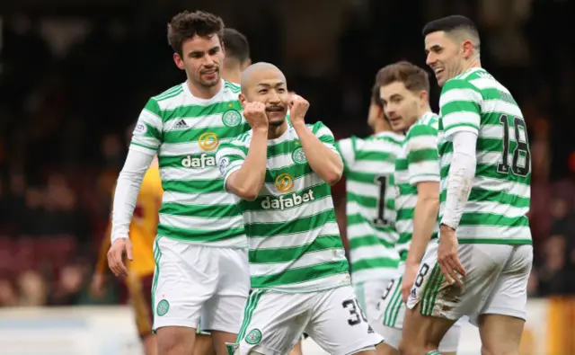 Daizen Maeda celebrates making it 4-0 at Fir Park