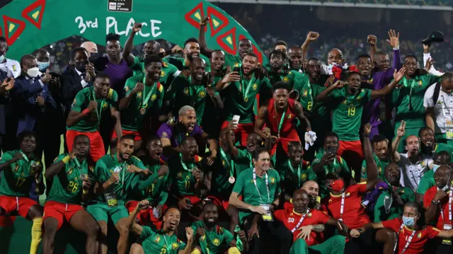 Cameroon celebrate third place at the Nations Cup