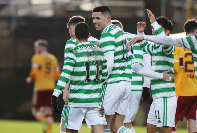 Tom Rogic (centre) has scored two great goals