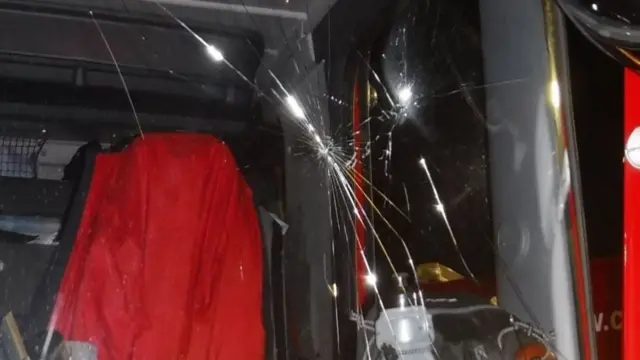 Broken windscreen of fire engine