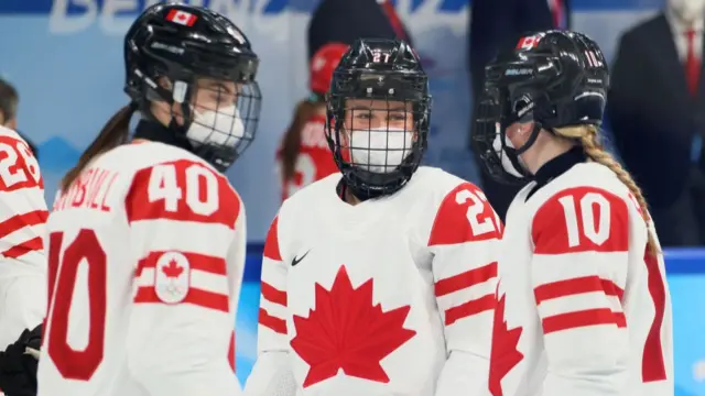 Canada players wear masks ahead of their match