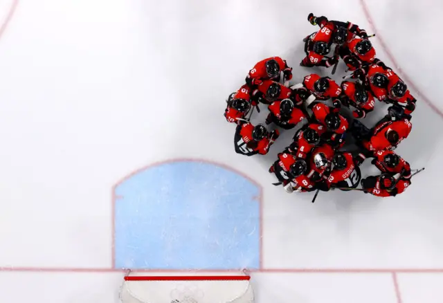 Japan's players celebrate their shootout win