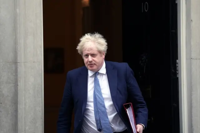 Prime Minister Boris Johnson leaves 10 Downing Street, London, to attend Prime Minister"s Questions at the Houses of Parliament on 2 February 2022