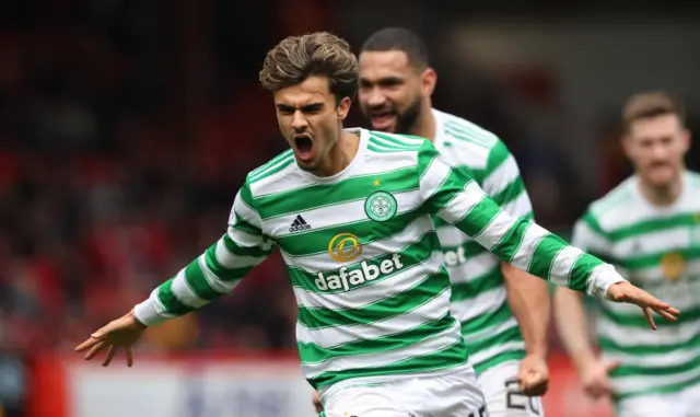 Jota celebrates his goal at Pittodrie