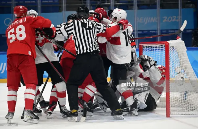 A fight between ROC  and Switzerland players