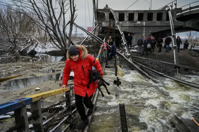 A collapsed bridge outside Kyiv