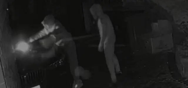 CCTV image of arson suspects.