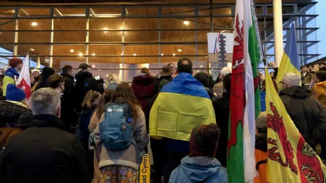 About 300 people gathered at a rally at the Senedd on Monday evening to show solidarity with the people of Ukraine.