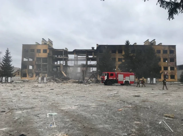 The shelled out remains of a still-standing Ukrainian military building in Okhtyrka