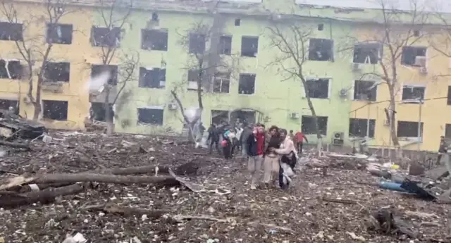 A person is carried out after the destruction of Mariupol children"s hospital